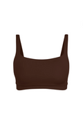 Brown bikini top on a white background