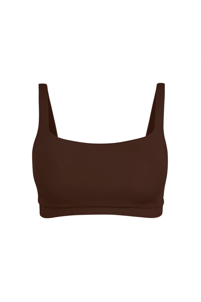 Brown bikini top on a white background