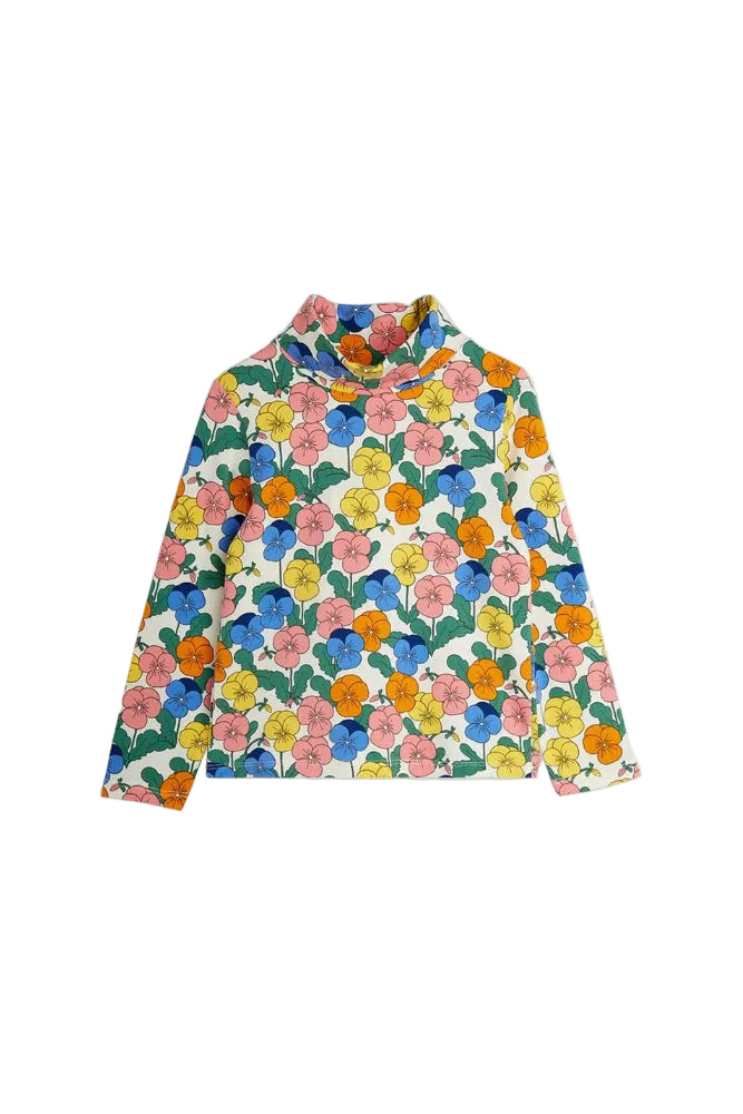 A long-sleeve mock neck top with a vibrant multicolor floral print on a cream background, displayed flat against a light gray backdrop.