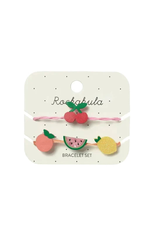 Package of two fruit themes bracelets on white background
