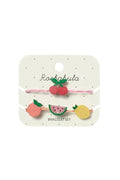 Package of two fruit themes bracelets on white background