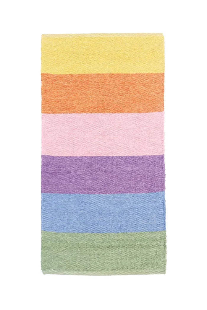 A rectangular striped rug with horizontal bands of yellow, orange, pink, purple, blue, and green on a plain white background.