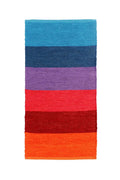 A rectangular woven rug with horizontal stripes in shades of blue, purple, red, and orange, shown flat against a white background.