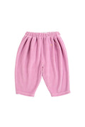 Pink baby pants on a white background
