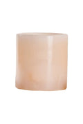 Pink marble candle holder against white background.