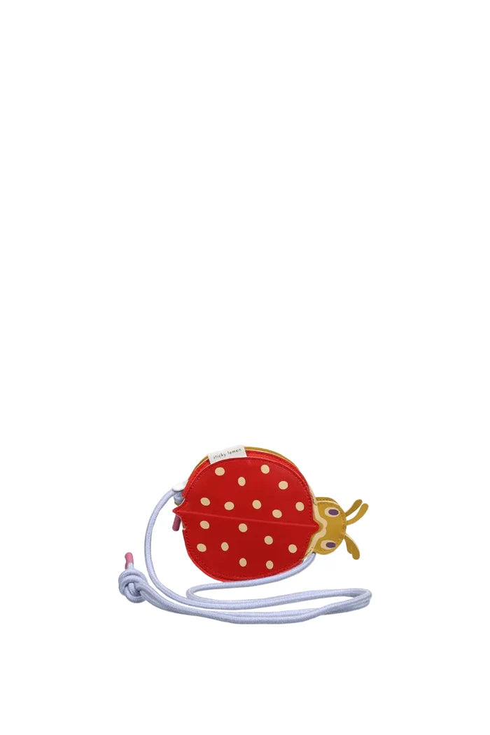 Ladybug-shaped pouch with a strap on a white background