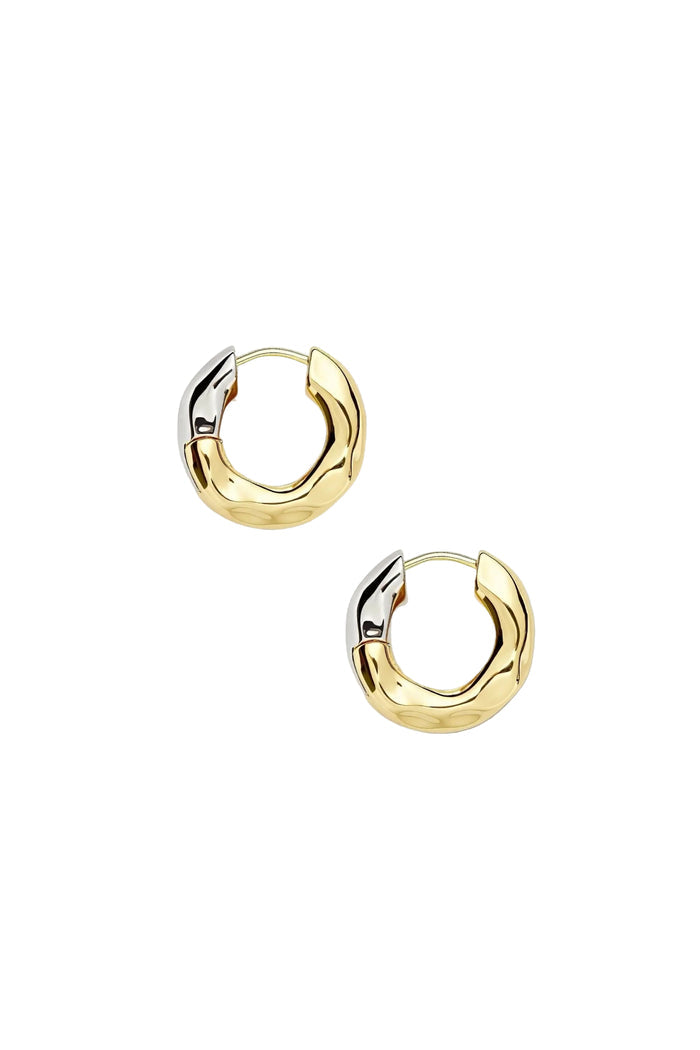 A pair of gold chunky hoop earrings with a rhodium plated recycled brass construction, featuring a hinge closure.