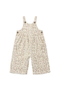 A baby's sleeveless overall romper with a beige and brown leopard print pattern, featuring adjustable shoulder straps with decorative buttons, photographed flat on a light gray background.