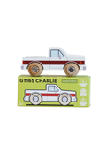 A wooden toy pickup truck labeled GT165 CHARLIE sits on top of its light green packaging box against a plain white background.