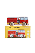 A red and white wooden toy fire truck with printed details, displayed on top of its yellow retail box labeled 'GT270 QUINN Limited Edition'.
