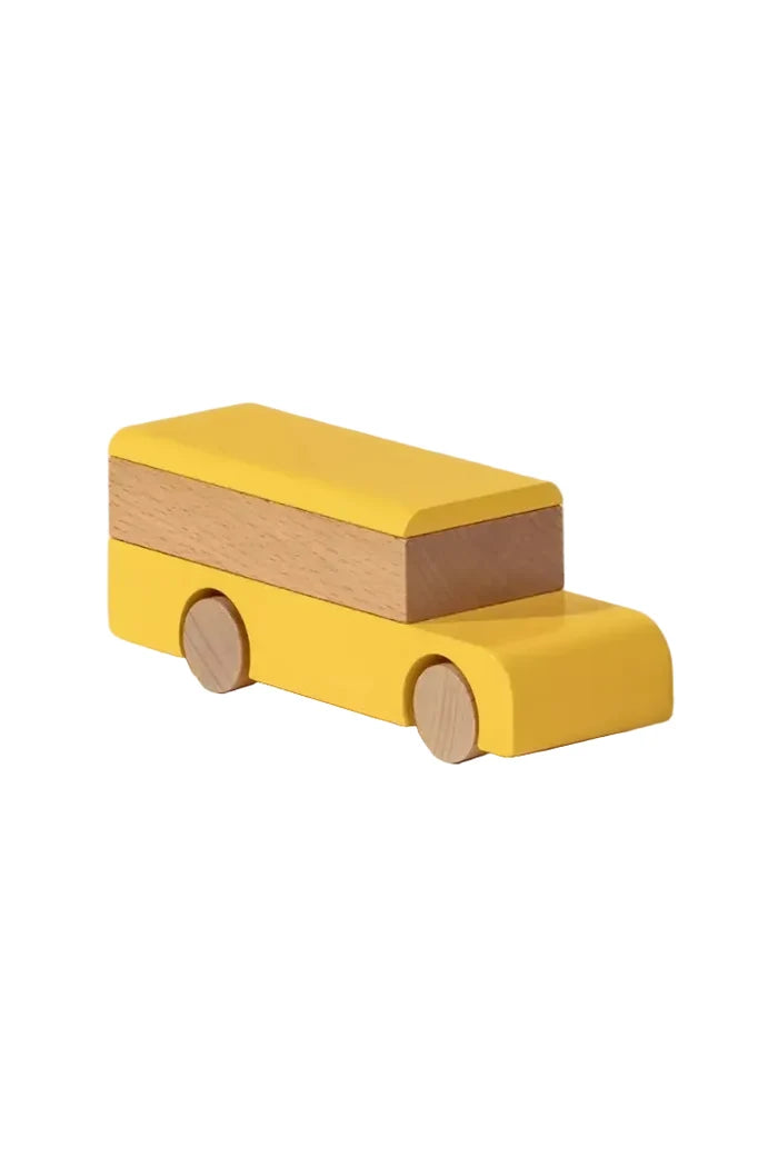 Wooden school bus toy on white background