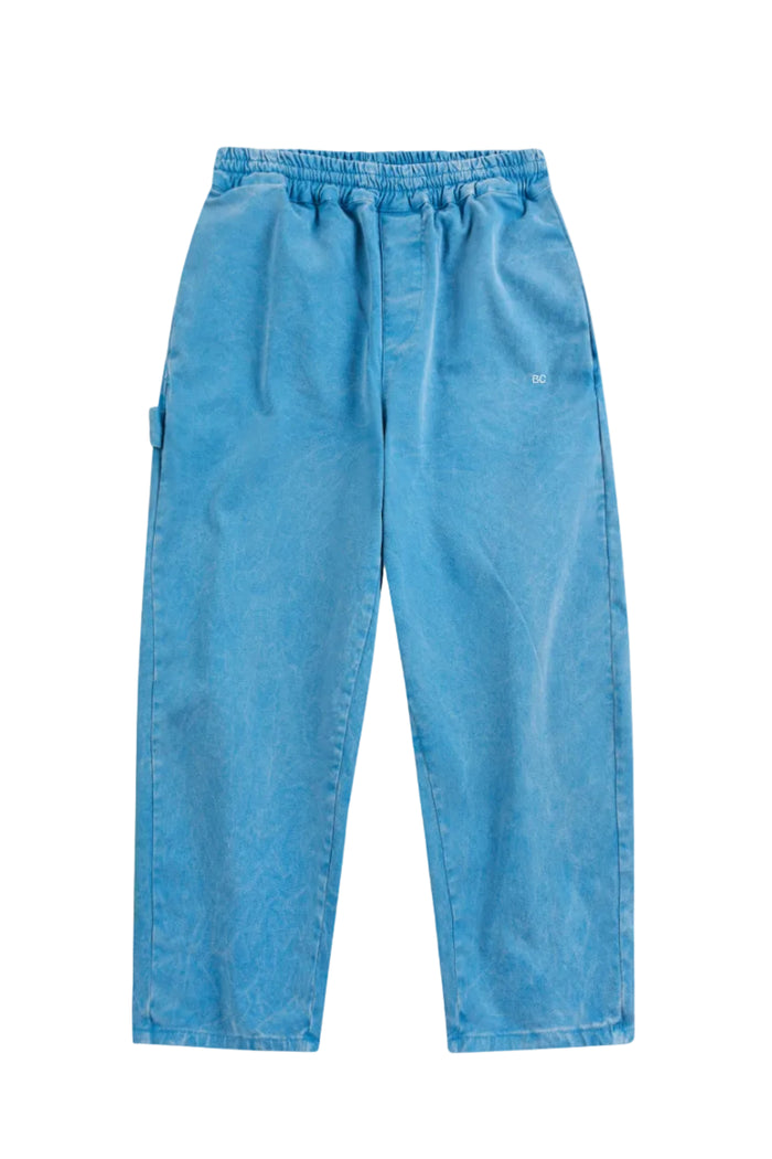 Blue kids pants on a white background